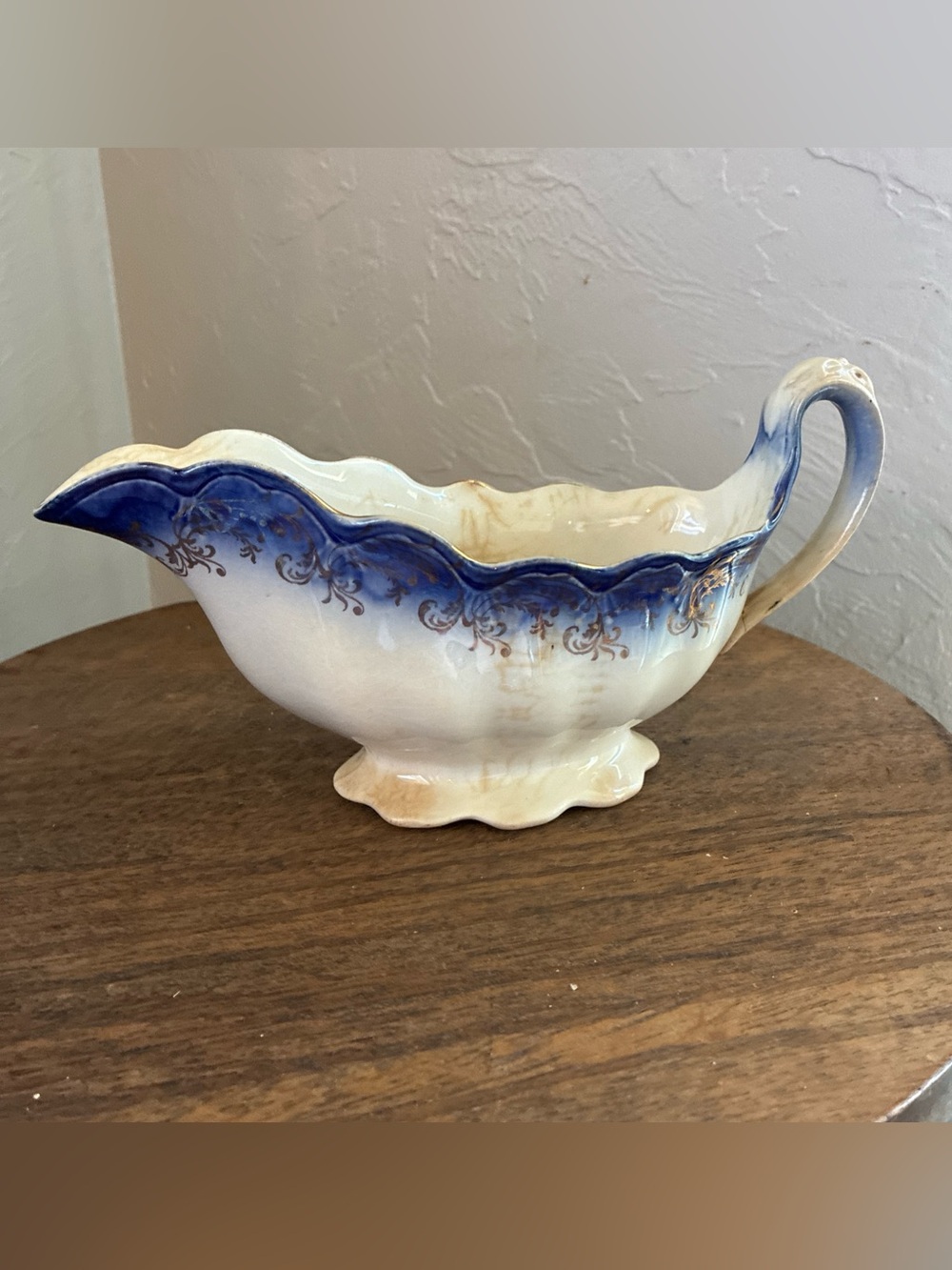 Vintage Flow Blue Gravy Boat with gold accents